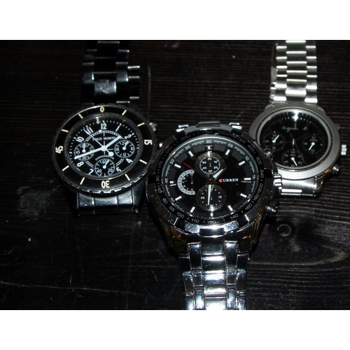 269 - Collection of gents quartz fashion watches, all running at time of listing