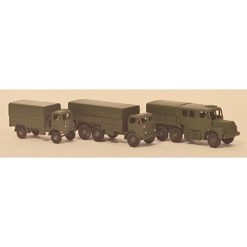 133 - Dinky Toys military group to include 689 Medium Artillery Tractor, 622 10-Ton Army Truck and 623 Arm... 