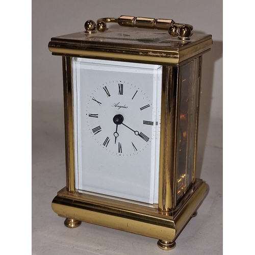 136 - Late 19th century French brass cased 8 day carriage clock with bevelled edged glass panels, ticking ... 