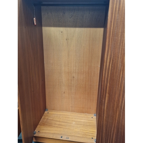 299 - G Plan Fresco vintage teak double wardrobe fitted with single hanging rail. Doors to front. 177x86x5... 