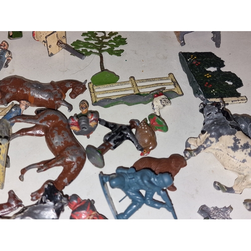 51 - Collection of Britains and other play worn farm animals and scenery.