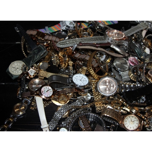 326 - A large collection of ladies and gents fashion watches