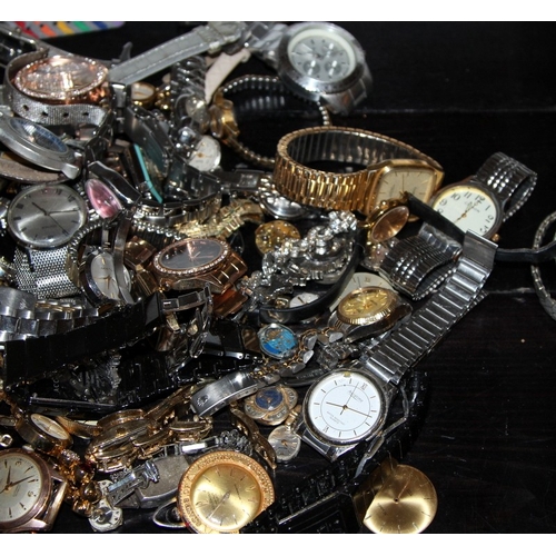 326 - A large collection of ladies and gents fashion watches