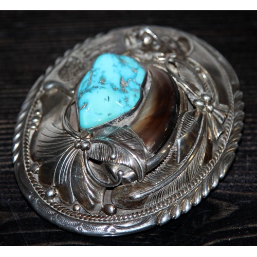 331 - Large Navajo tested silver with turquoise belt buckle with bear motif signed J.P.J. 80mm across and ... 