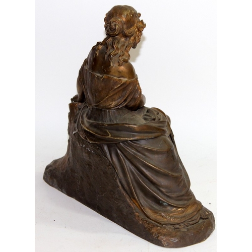 109 - Large antique cast metal figure of a classical woman sitting with a basket of flowers. 32cms across