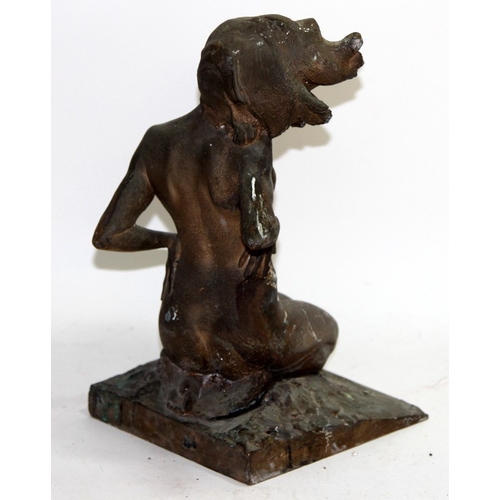 110 - Vintage cast metal figure of kneeling naked woman looking windswept and interesting. 30cms tall