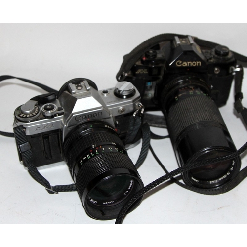 111 - Canon 35mm SLR: A collection of vintage Canon 35mm film SLR cameras, 7 in lot, all fitted with canon... 