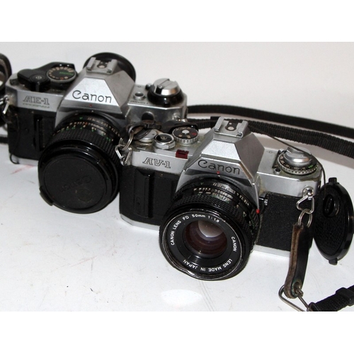 111 - Canon 35mm SLR: A collection of vintage Canon 35mm film SLR cameras, 7 in lot, all fitted with canon... 