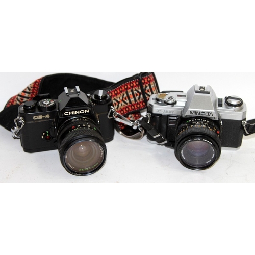 115 - A collection of vintage 35mm film SLR cameras, mostly with lenses, Olympus, Nikon, Minolta etc. Incl... 