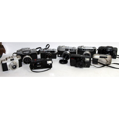 117 - A collection of vintage 35mm compact film cameras including Olympus, Yashica, Nikkorex etc