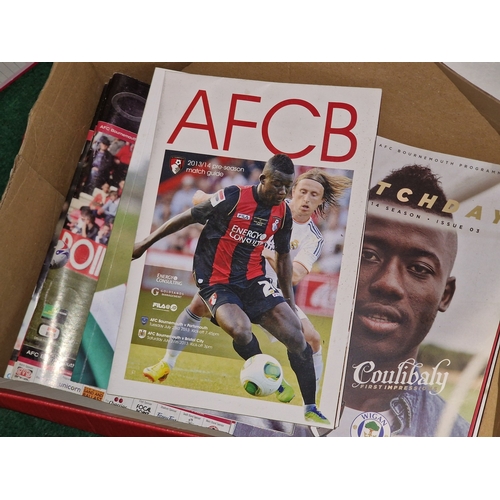 274 - Local football interest: A huge collection of AFC Bournemouth matchday programmes dating from 1970 o... 