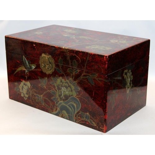 291 - Lacquerware storage box with Oriental style decoration and lined interior. 48cms x 27cms x 29cms