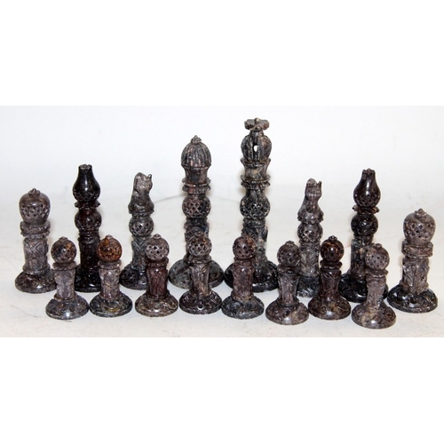 94 - Vintage hand carved soapstone chess set complete in a vintage leather attache case.