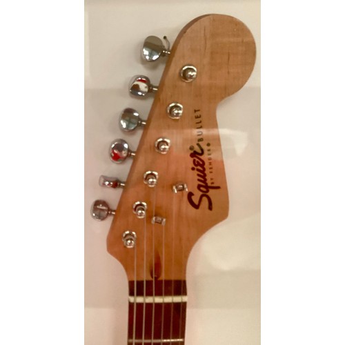 371 - THE EAGLES SIGNED AND FRAMED FENDER SQUIER STRATOCASTER ELECTRIC GUITAR. A very successful group who... 