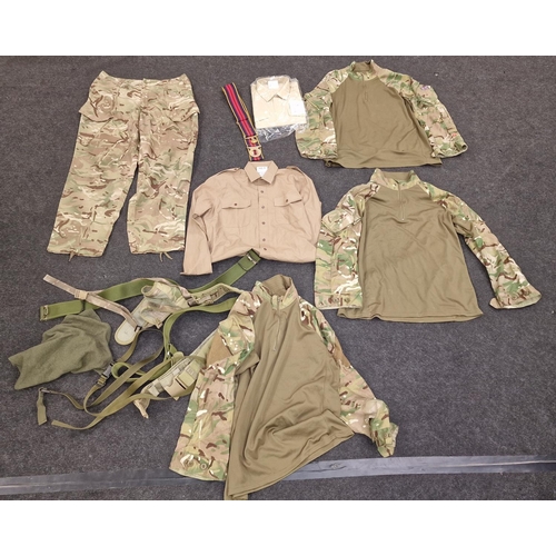 103 - Collection of British Army camo clothing to include new old stock shirt, belts, trousers etc.