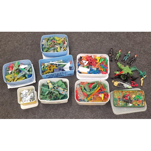 229 - Large quantity of plastic Cowboys/Indians/Soldiers together with vehicles and scenic items.