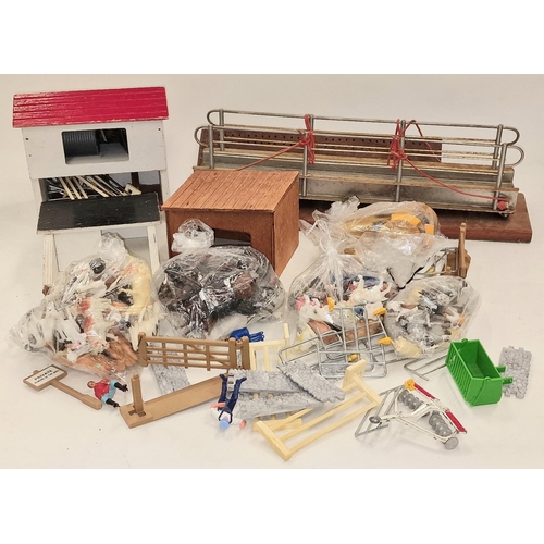 233 - Vintage farmyard playset to include a collection of plastic animals and wooden scenery buildings etc... 