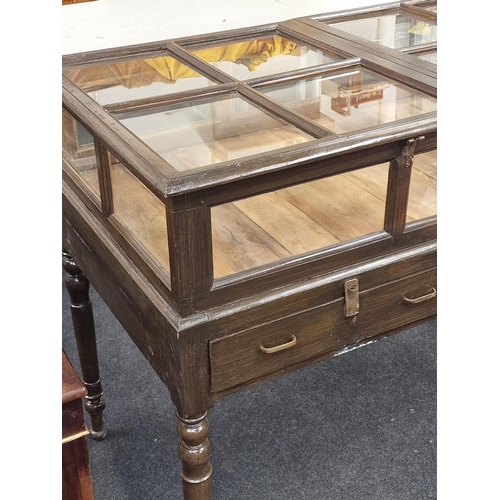 238 - An early 20th century mahogany double sided shopkeepers jewellery display case with glazed top resti... 