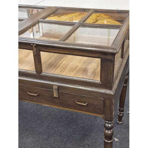 238 - An early 20th century mahogany double sided shopkeepers jewellery display case with glazed top resti... 