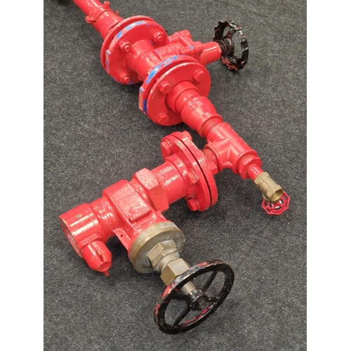 242 - From a prop company: A red painted reclaimed adjustable choke valve possibly used in oil and gas or ... 