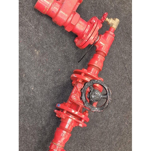 244 - From a prop company: A red painted reclaimed adjustable choke valve possibly used in oil and gas or ... 