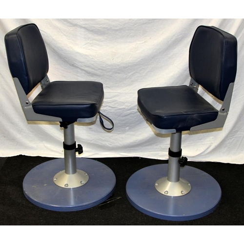 218 - Pair of trawler skipper swivel chairs with fold down backs and adjustable seat height