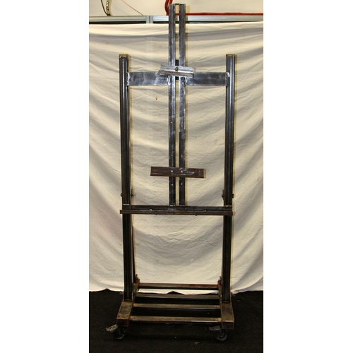 249 - Heavy duty large easel manufactured from welded box and angle steel. O/all height of frame 170cms