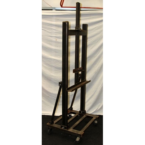 249 - Heavy duty large easel manufactured from welded box and angle steel. O/all height of frame 170cms