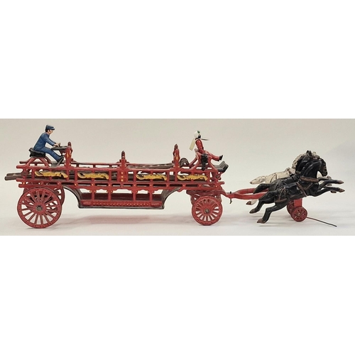 180 - Antique early 20th century cast iron horse drawn fire ladder wagon. Comes in two parts. Total length... 