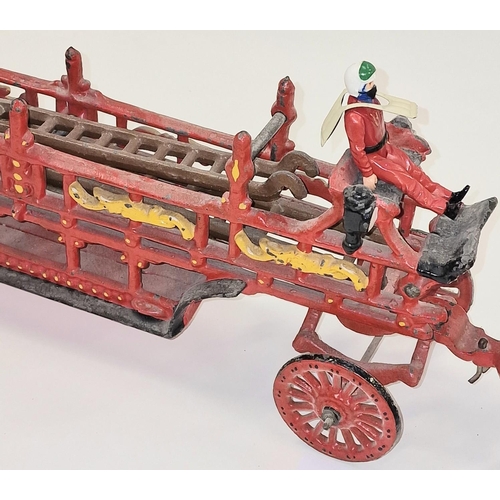 180 - Antique early 20th century cast iron horse drawn fire ladder wagon. Comes in two parts. Total length... 