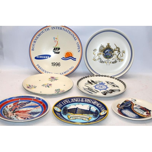 267 - Poole Pottery: A varied collection of Poole to include a number of map plates depicting various regi... 