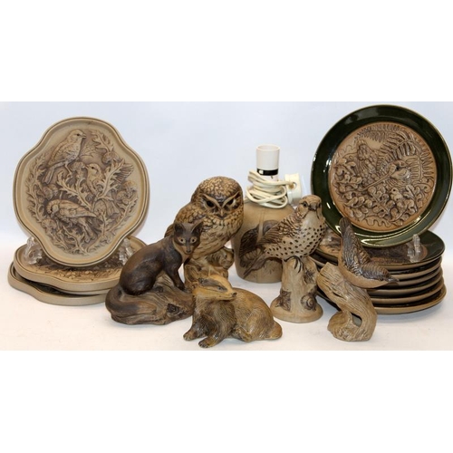 271 - Poole Pottery: A collection of stoneware items including commemorative plates and wall plaques, an O... 