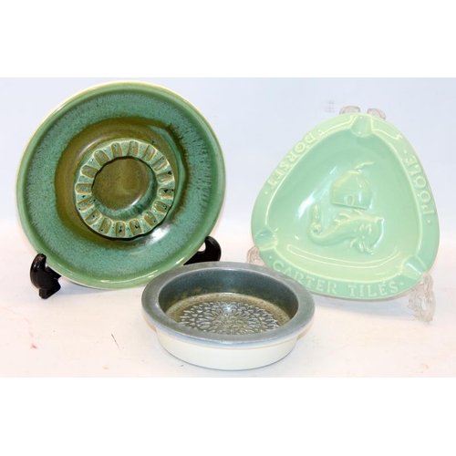 273 - Poole Pottery: A Carter Tiles advertising ashtray, a Poole Studio blue stamp small bowl and a green ... 