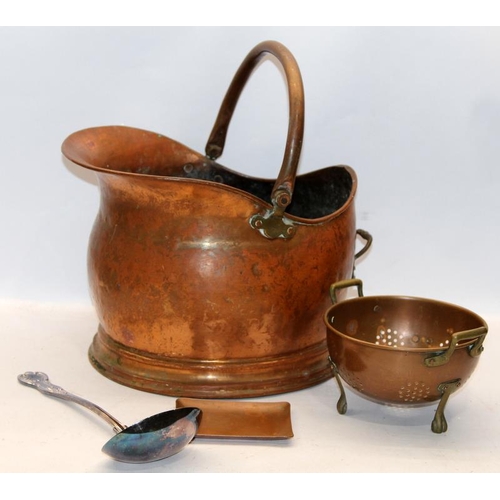 42 - Antique copper helmet coal scuttle c/w copper colander, tray and a silver plated ladle