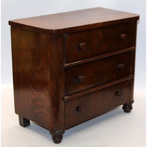 43 - Apprentice piece three drawer chest of drawers finished in flame mahogany veneer. 38cms across x 33c... 