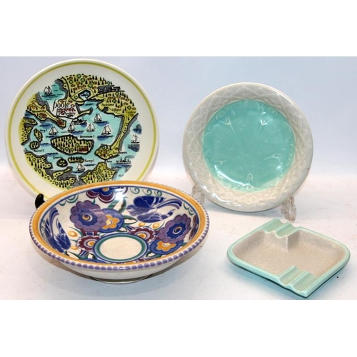 45 - Four pieces of Poole Pottery to include an early 24cms footed bowl in the PB Bluebird pattern and a ... 