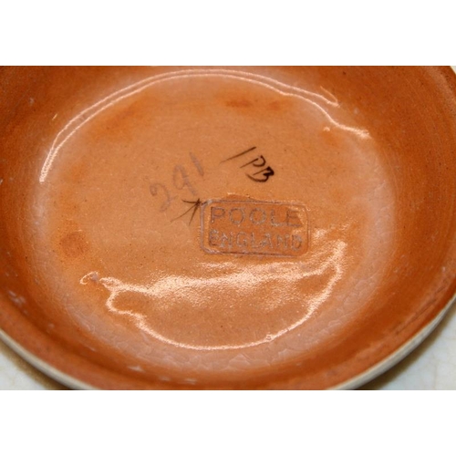 45 - Four pieces of Poole Pottery to include an early 24cms footed bowl in the PB Bluebird pattern and a ... 