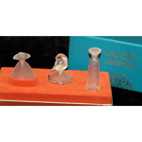 76 - Lalique set of three miniature perfume bottles, 'The Ultimate Collection',  boxed. (bottles are empt... 