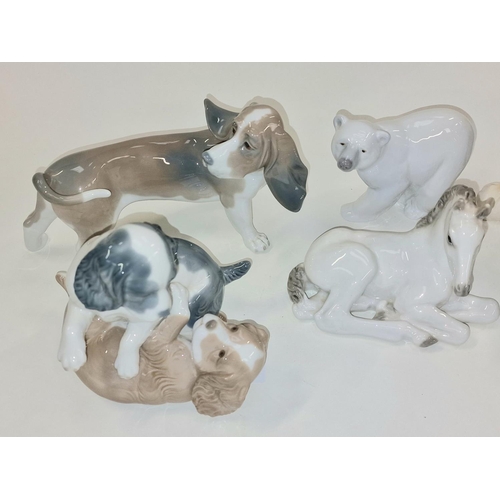 47 - Lladro model of a Basset dog, together with a Polar Bear, Nao playing puppies, Beswick cart horse pl... 