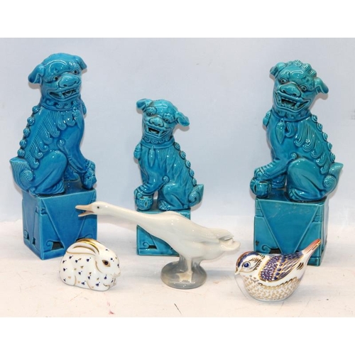 122 - Three vintage turquoise foo dogs, the larger pair being 21cms c/w a Lladro goose and Royal Crown Der... 