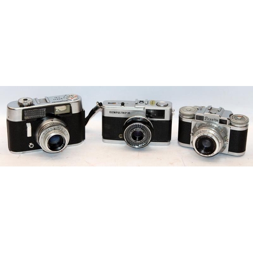 125 - Vintage compact 35mm film cameras: Olympus Trip 35 (Japan made). Voigtlander Vito CD and a Braun Pax... 