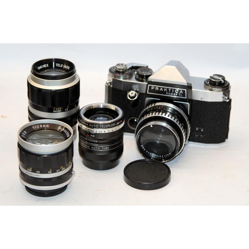 126 - Vintage Praktica Super TL 35mm film SLR camera c/w lenses and other accessories in a fitted transpor... 