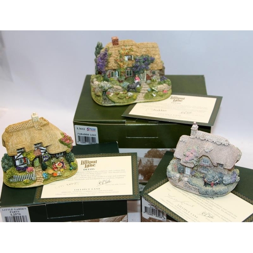 136 - A collection of Lilliput Lane cottages: Dunster Yarn Market, Paradise Lost, With Thanks, Little Gard... 