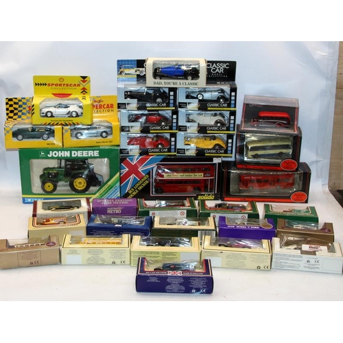 159 - A collection of die-cast model vehicles by Lledo, EFE, Corgi, ERTL etc, Includes an ERTL John Deere ... 