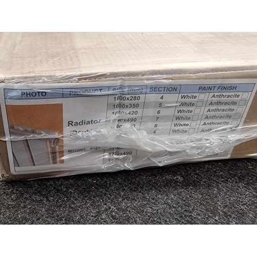 259 - A collection of brand new sealed radiators. Various sizes. Eight in total.