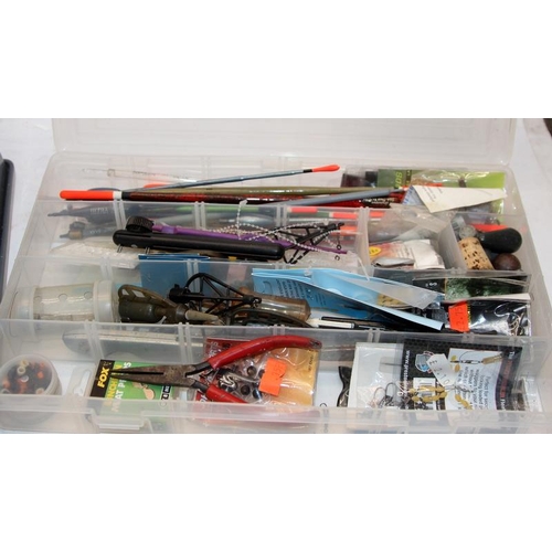 167 - A large quantity of fishing tackle including floats, weights, flies etc contained within a number of... 