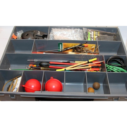 167 - A large quantity of fishing tackle including floats, weights, flies etc contained within a number of... 