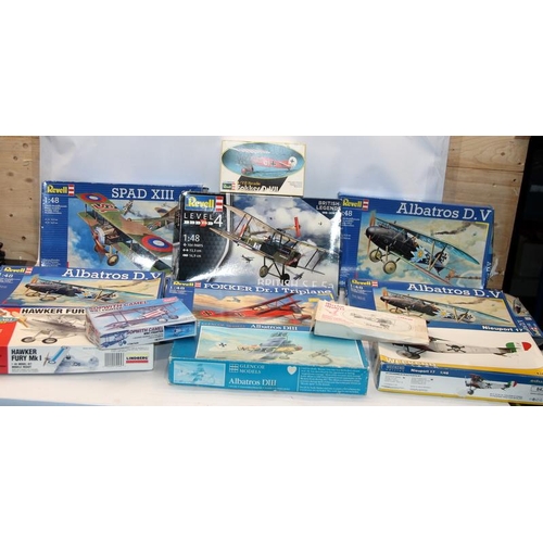 93 - Model Kits: A collection of Bi/Tri Plane model kits by Revell, Eduard, Academy, Lindberg, Glencoe et... 