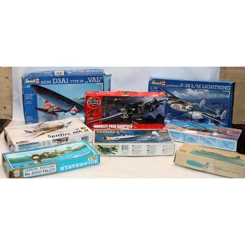 94 - Model Kits: A collection of WWII era model aircraft, Airfix, Revell, Academy etc. 8 items in lot, bo... 