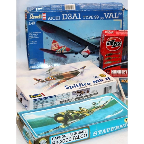 94 - Model Kits: A collection of WWII era model aircraft, Airfix, Revell, Academy etc. 8 items in lot, bo... 